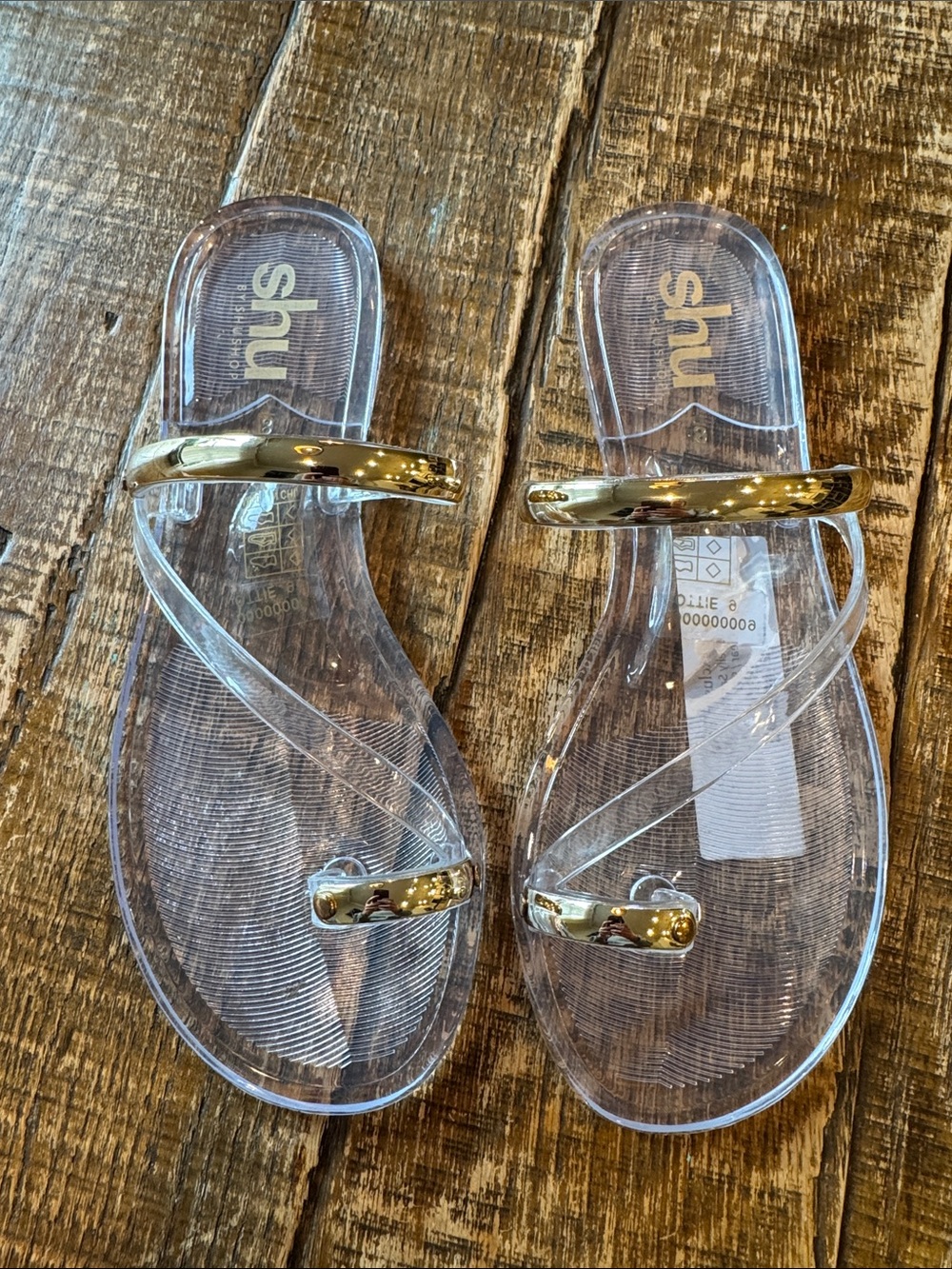 Jelly shoes with gold detail and toe wrap. Size 9
